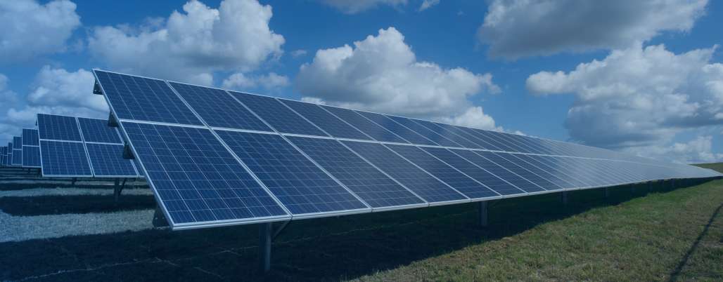 Solar panels on a sunny field