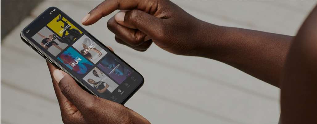 Person using Equinox app on a smartphone